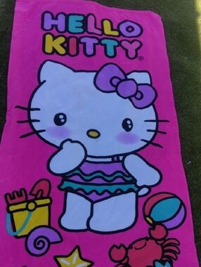 Sanrio Hello Kitty Hot Pink Beach Towel with Multicolor Graphic